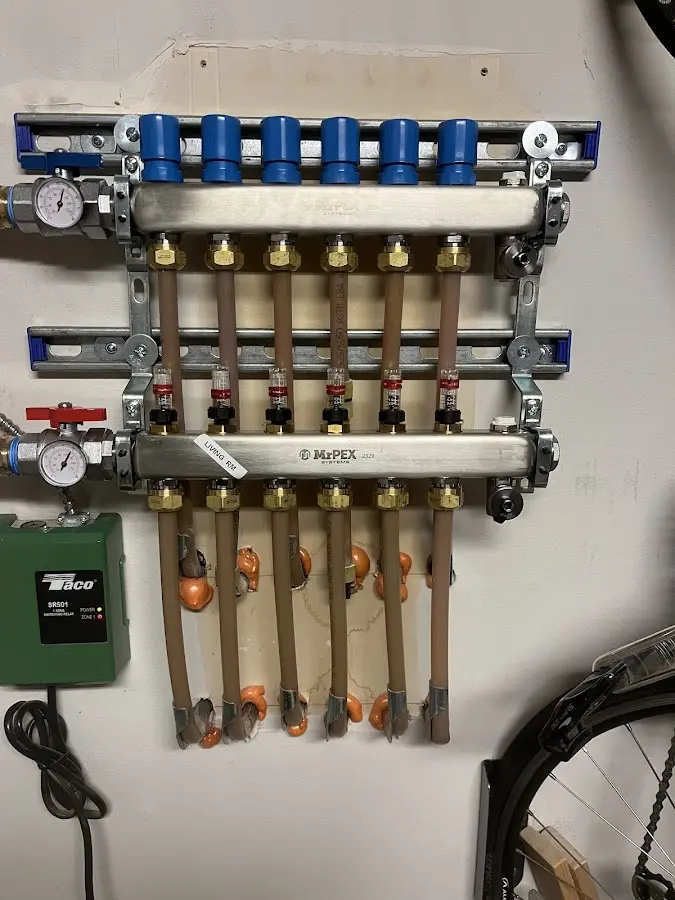 Plumber performing Gas Leak Detection at a residential property in Fair Haven